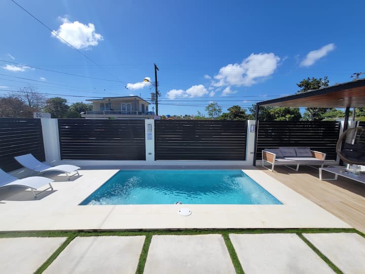 Pool and covered lounge at Isabela Escape House