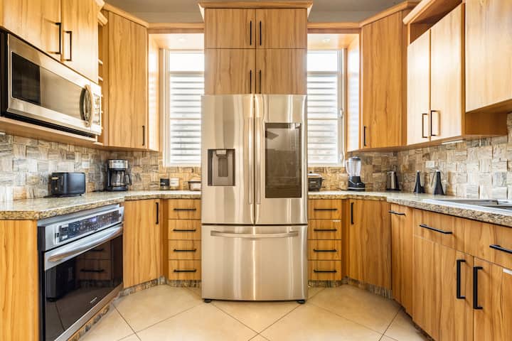 Fully equipped wood kitchen at Oasis Escape House